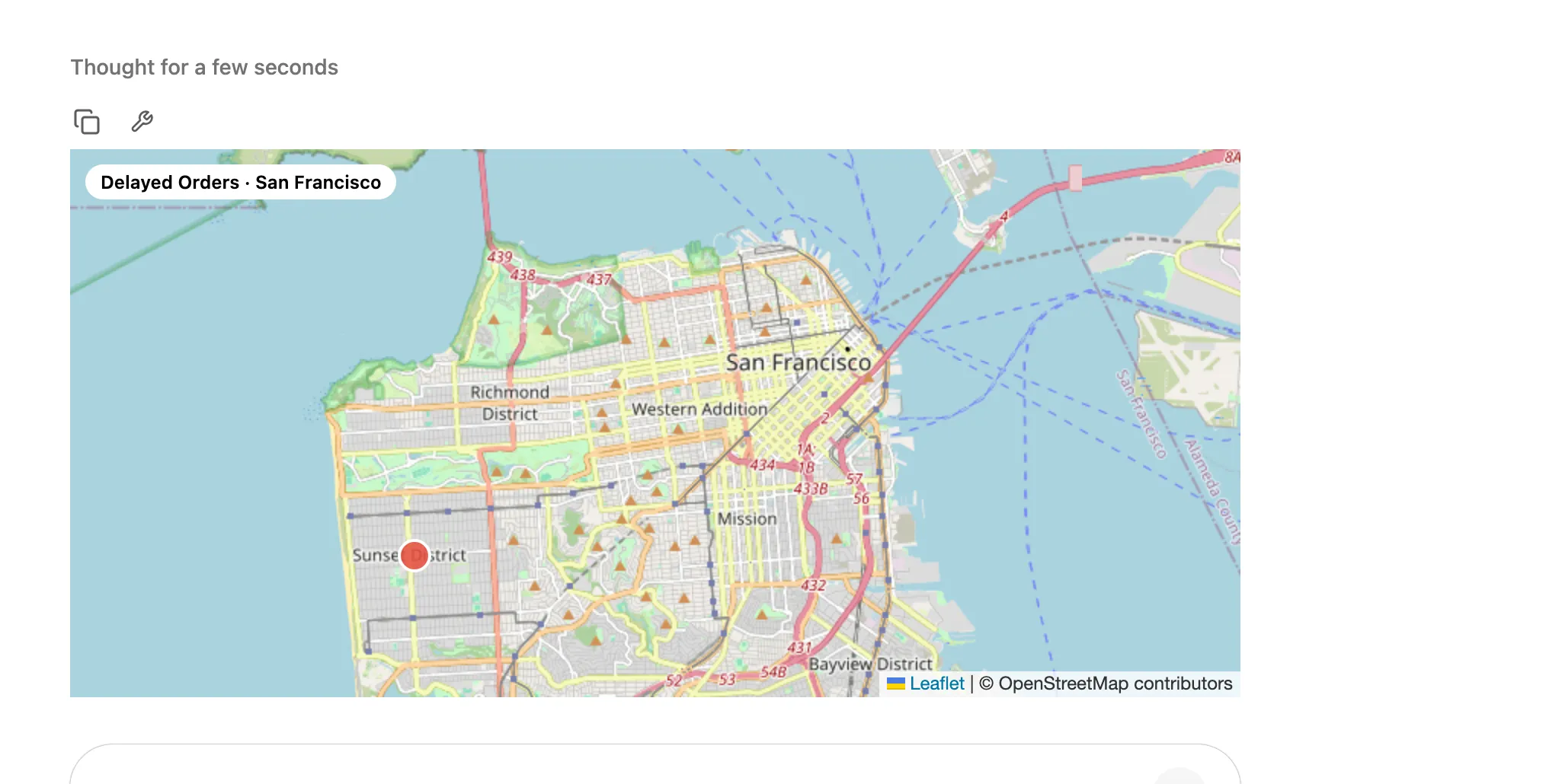 The chat after asking 'Only show the delayed ones': a second map titled 'Delayed Orders · San Francisco' with a single red marker.